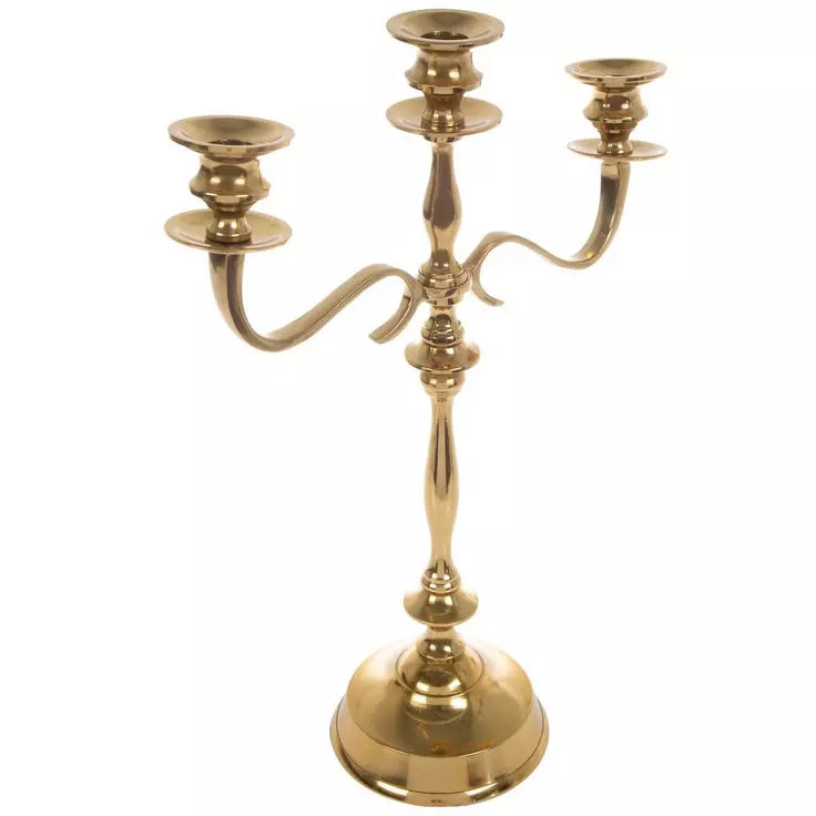 Candelabro de metal dorado