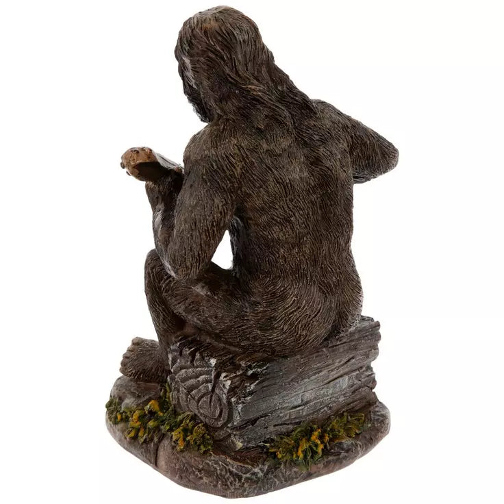 Figura de Sasquatch tocando la guitarra