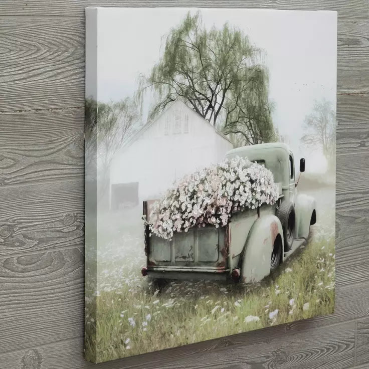 LIENZO DE PETUNIAS EN UN VIEJO CAMIÓN