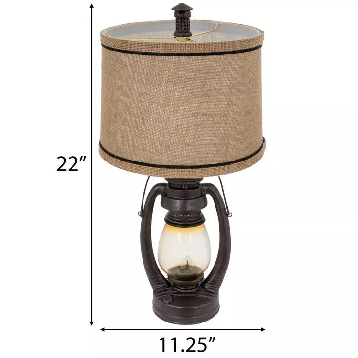 Lámpara de farol industrial antigua con pantalla de arpillera