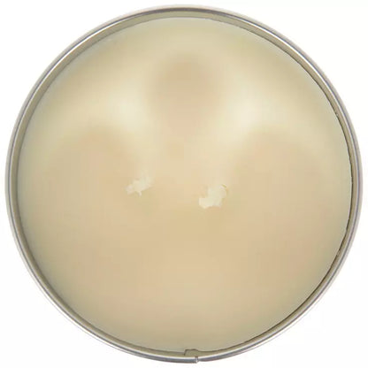 Vela en lata paleta de naranja y crema