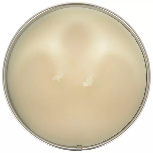 Vela en lata paleta de naranja y crema