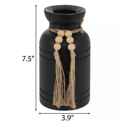 Jarrón de madera tallada en negro