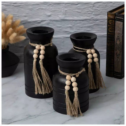 Jarrón de madera tallada en negro